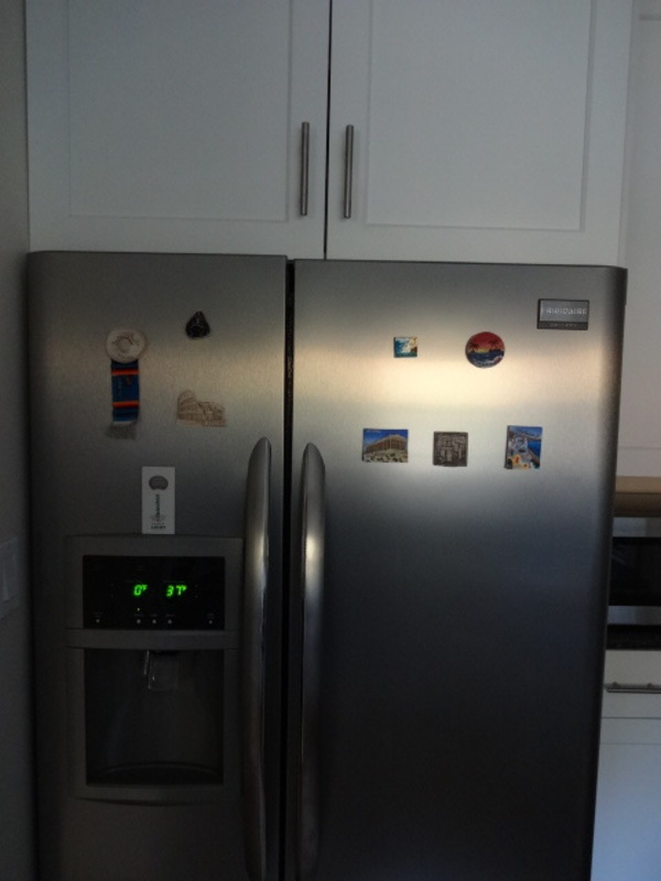 how to stick pictures on a stainless steel refrigerator