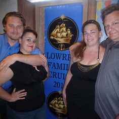 Part of the family with our family banner.