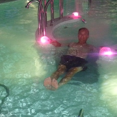 relaxing in the pool at night