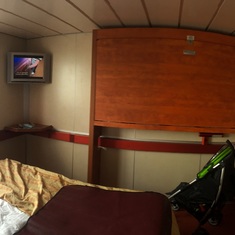 Spare bed on wall